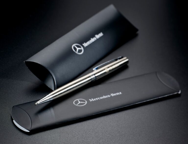Silver pen in a branded pillow sleeve