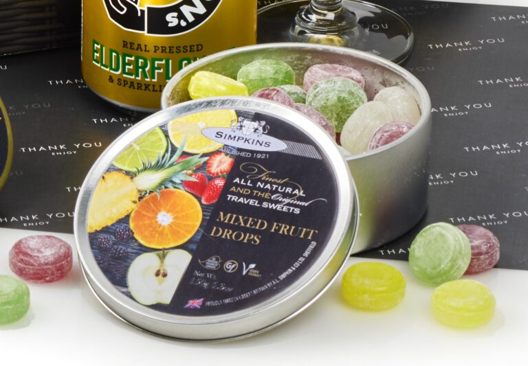 Tin of travel sweets on Thank You Enjoy branded tissue paper